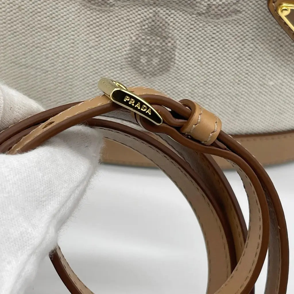 Prada Natural Linen Blend And Leather Buckle Bag